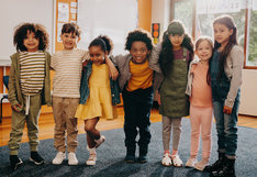 diverse students smiling at camera